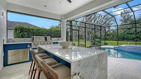 a kitchen with a stove and a sink