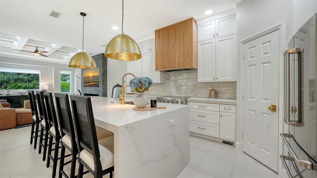 3415 162nd Avenue East Parrish, FL 34219 - Photo 5 of 49 a kitchen with cabinets and window