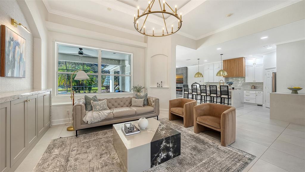 3415 162nd Avenue East Parrish, FL 34219 - Photo 6 of 49 a living room with furniture and a large window