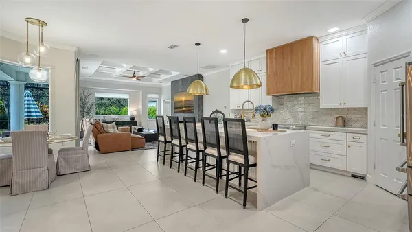 a kitchen with counter top space cabinets and stainless steel appliances