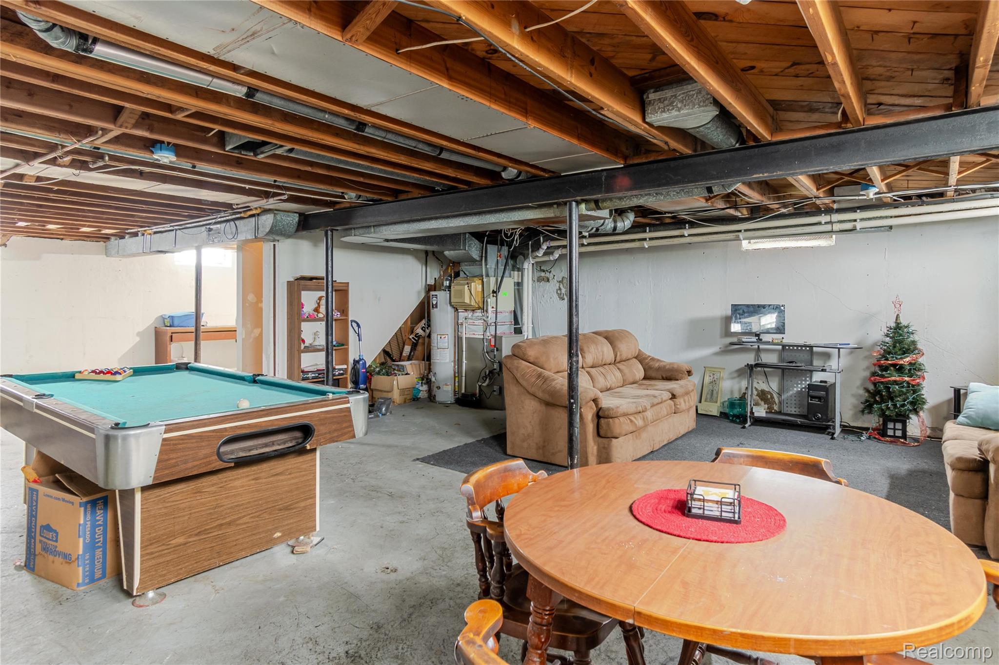 534 Henry Ruff Road Garden City, MI 48135 - Photo 22 of 32 Below grade area featuring heating unit, water heater, and pool table