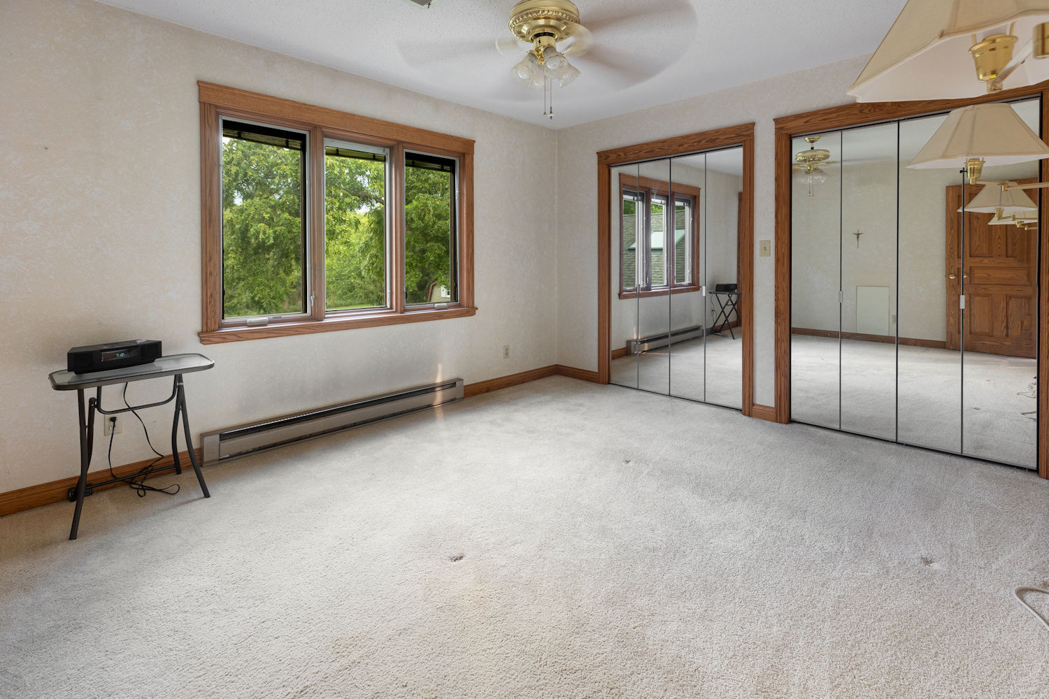 5857 South Brooklyn Road Rochelle, IL 61068 - Photo 20 of 31 a view of an empty room with windows & cabinet