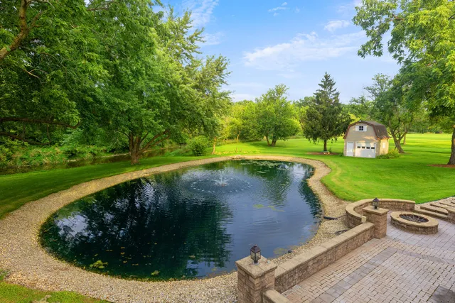 a view of a swimming pool with a patio