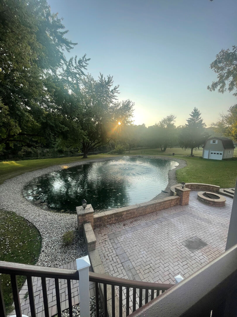 5857 South Brooklyn Road Rochelle, IL 61068 - Photo 4 of 31 a view of a lake from a balcony