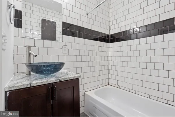 a view of a kitchen with a sink