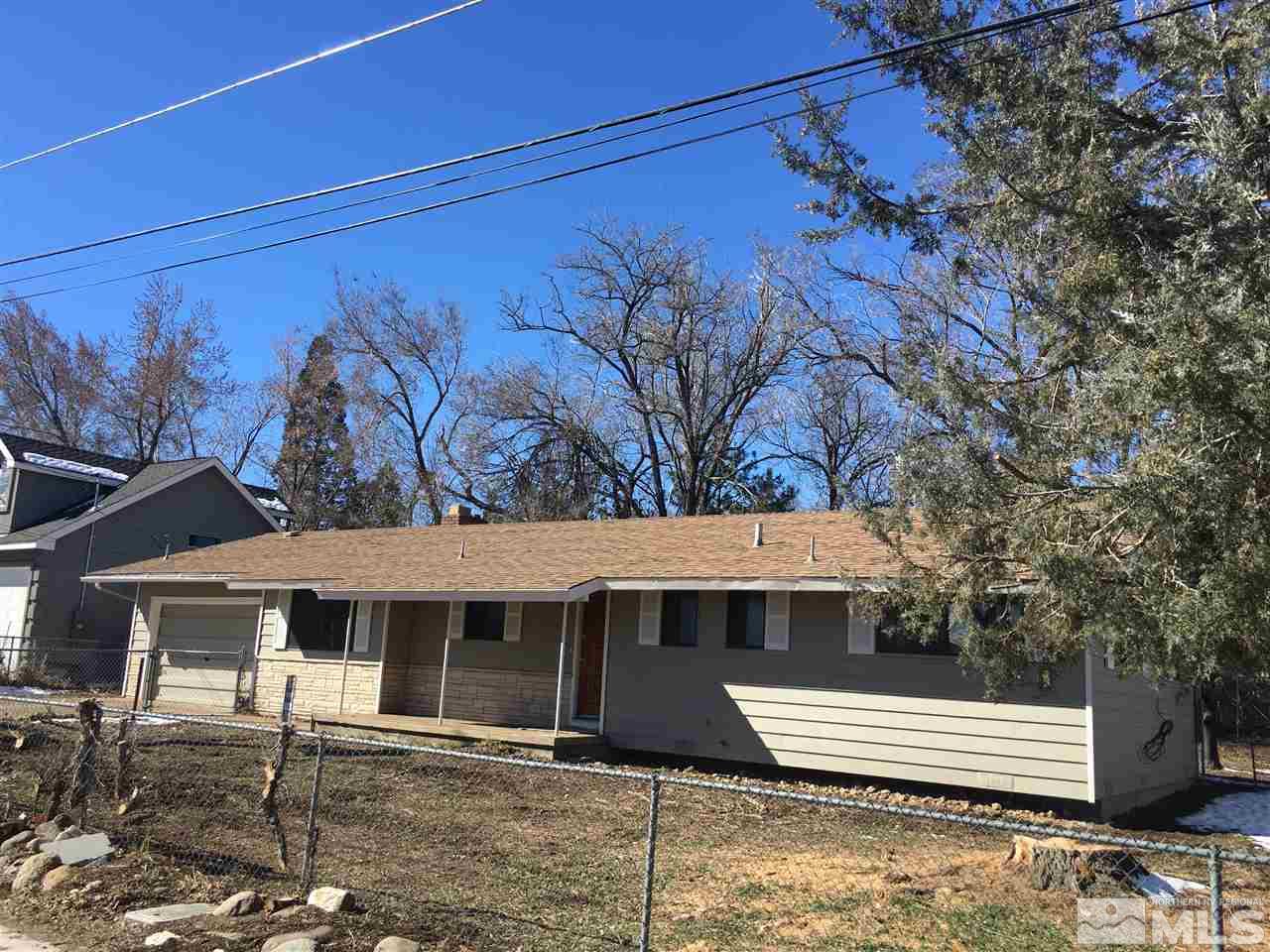 2345 Shampine Way Reno, NV 89509 - Photo 1 of 1 front view of a house with a bench