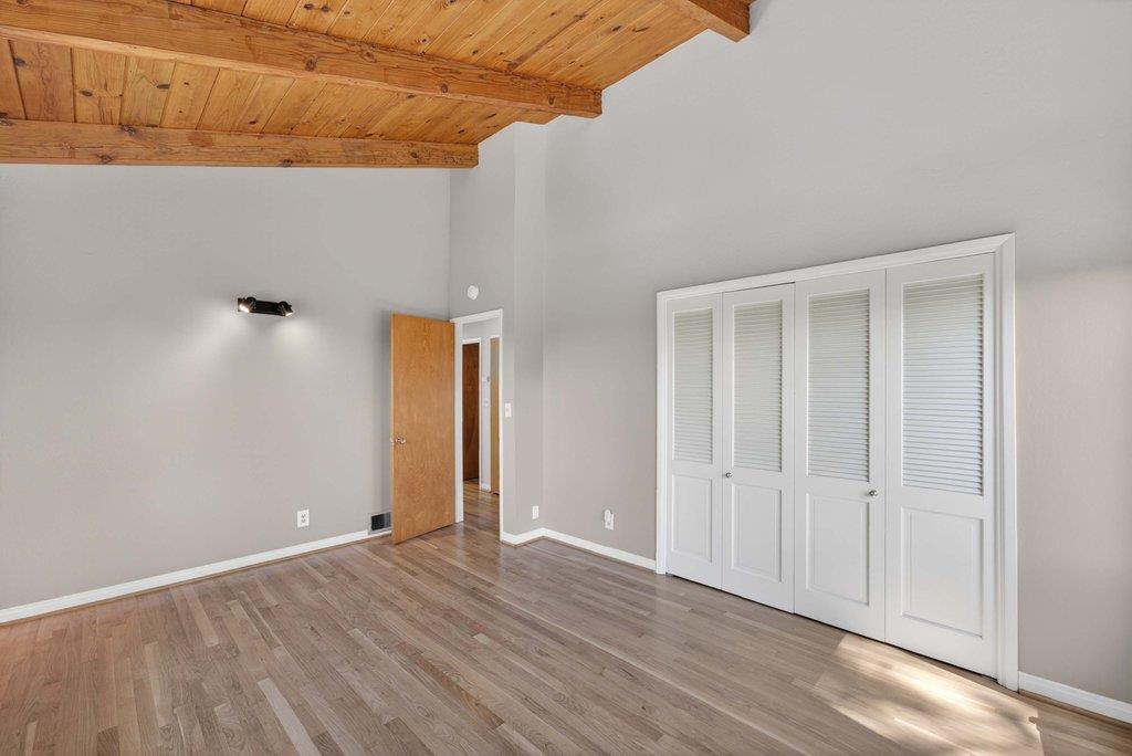 505 Hidden Valley Road Watsonville, CA 95076 - Photo 41 of 72 a view of an empty room with wooden floor