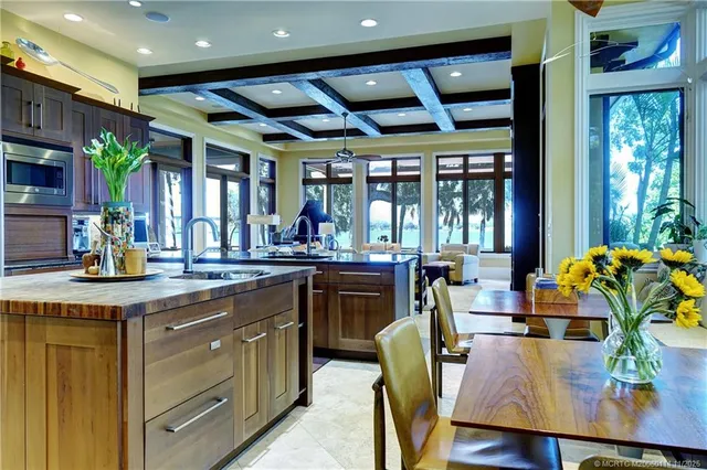 a view of a yard with a bench and trees