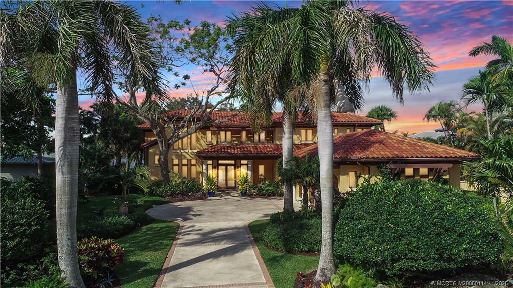31 North River Road Stuart, FL 34996 - Photo 5 of 91 a view of a park that has a sign board large trees