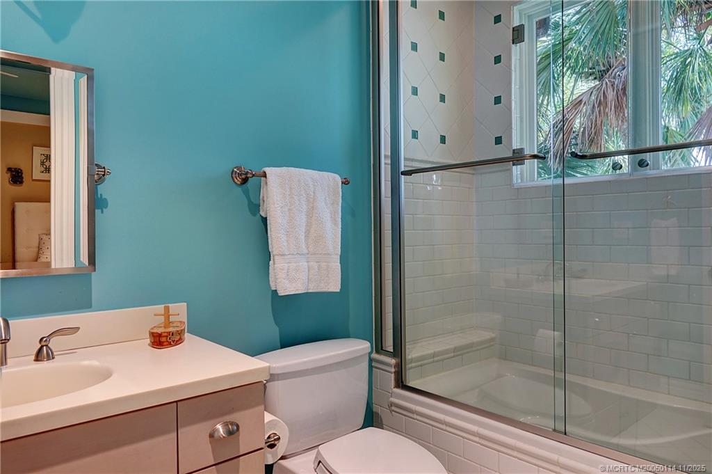 31 North River Road Stuart, FL 34996 - Photo 52 of 91 a bathroom with a sink toilet and shower