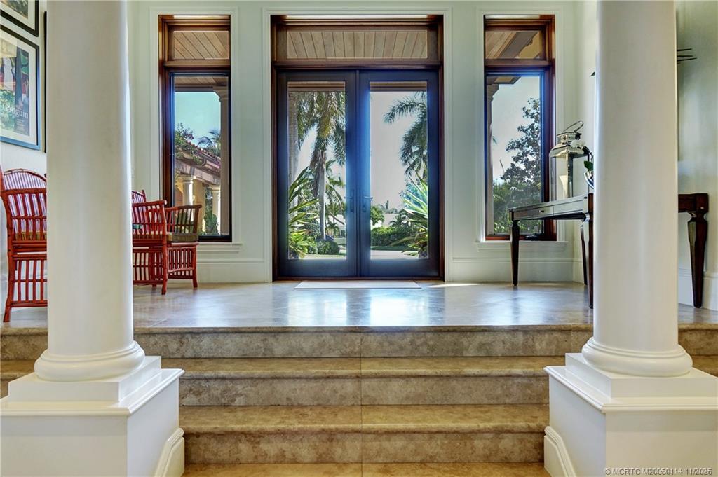 31 North River Road Stuart, FL 34996 - Photo 10 of 91 a view of lobby with two door and wooden floor