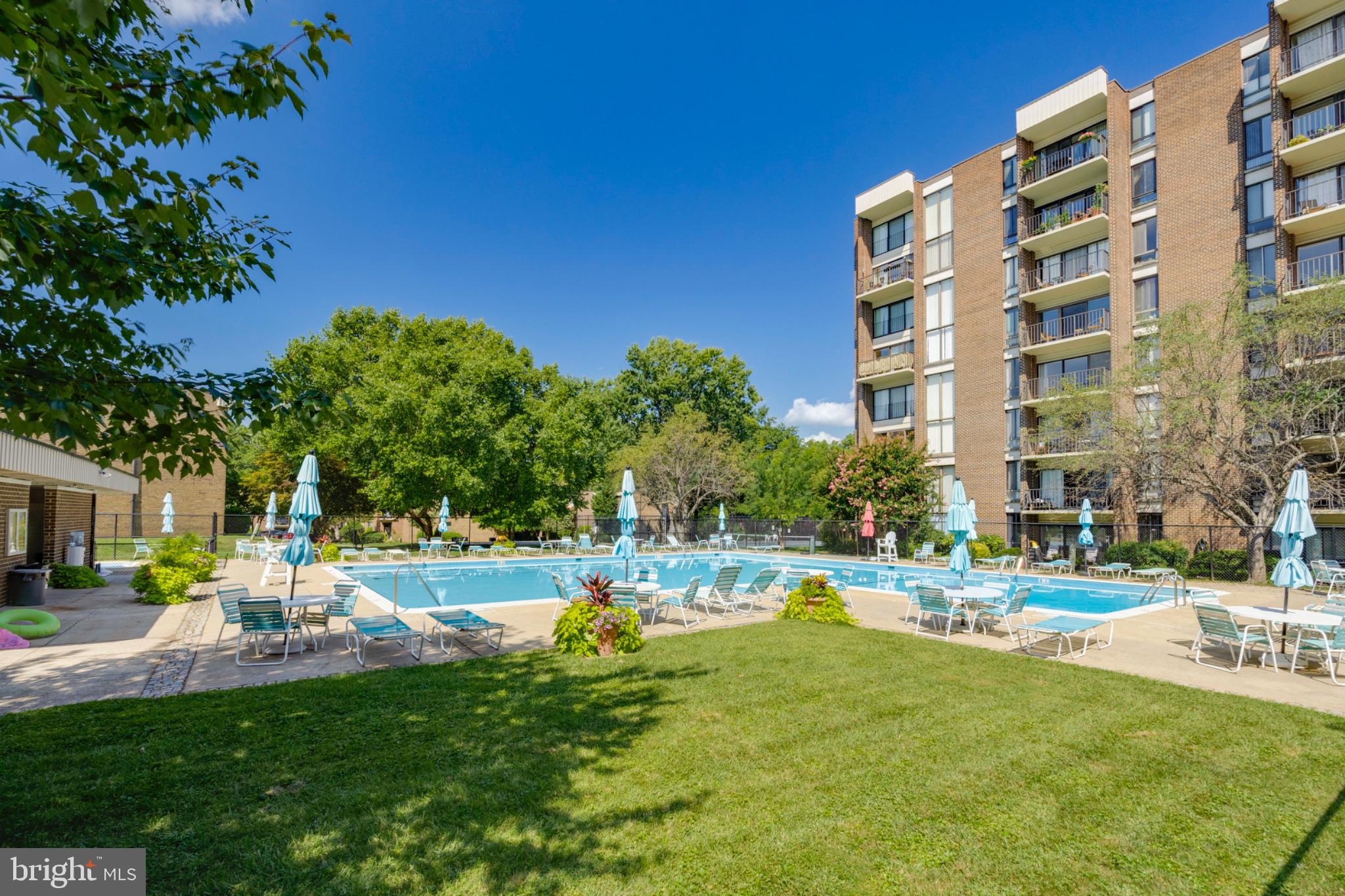 2004 Coleridge Drive, Unit 20201 Silver Spring, MD 20902 - Photo 25 of 26 Sunny oasis with inviting poolside.
