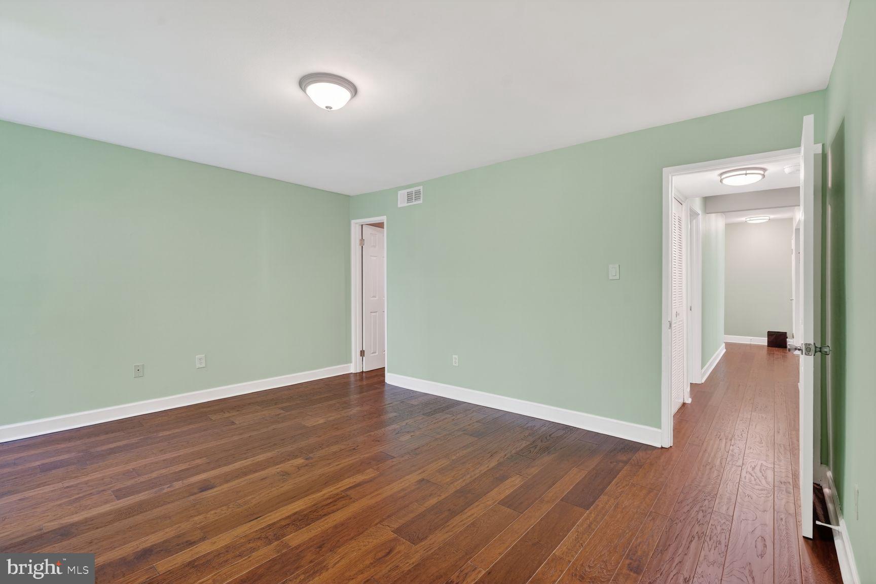 2004 Coleridge Drive, Unit 20201 Silver Spring, MD 20902 - Photo 10 of 26 Primary bedroom with walk-in closet