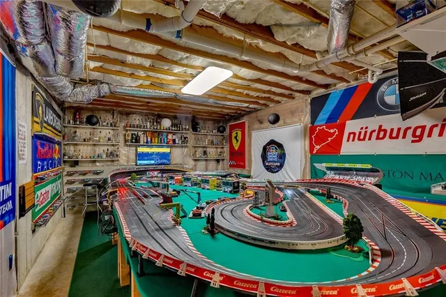 a view of a swimming pool with a yard and plants