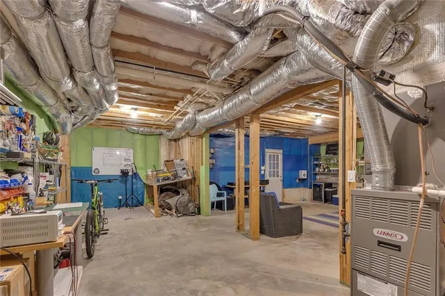 an aerial view of a house with outdoor space