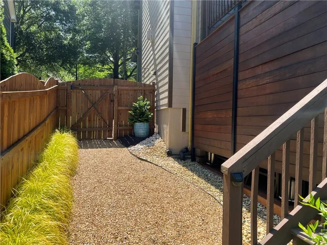 an aerial view of a house with a garden