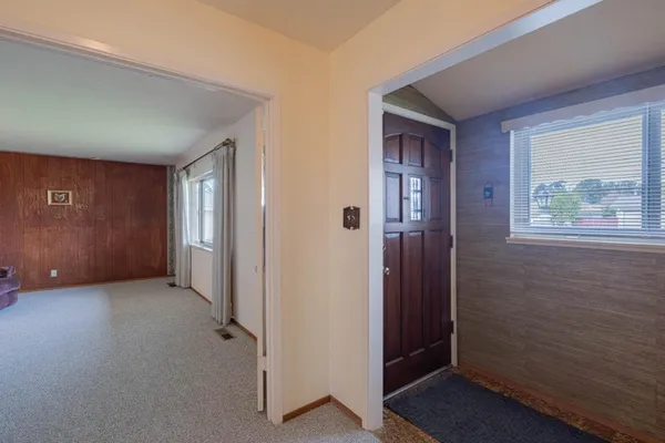 an empty room with windows