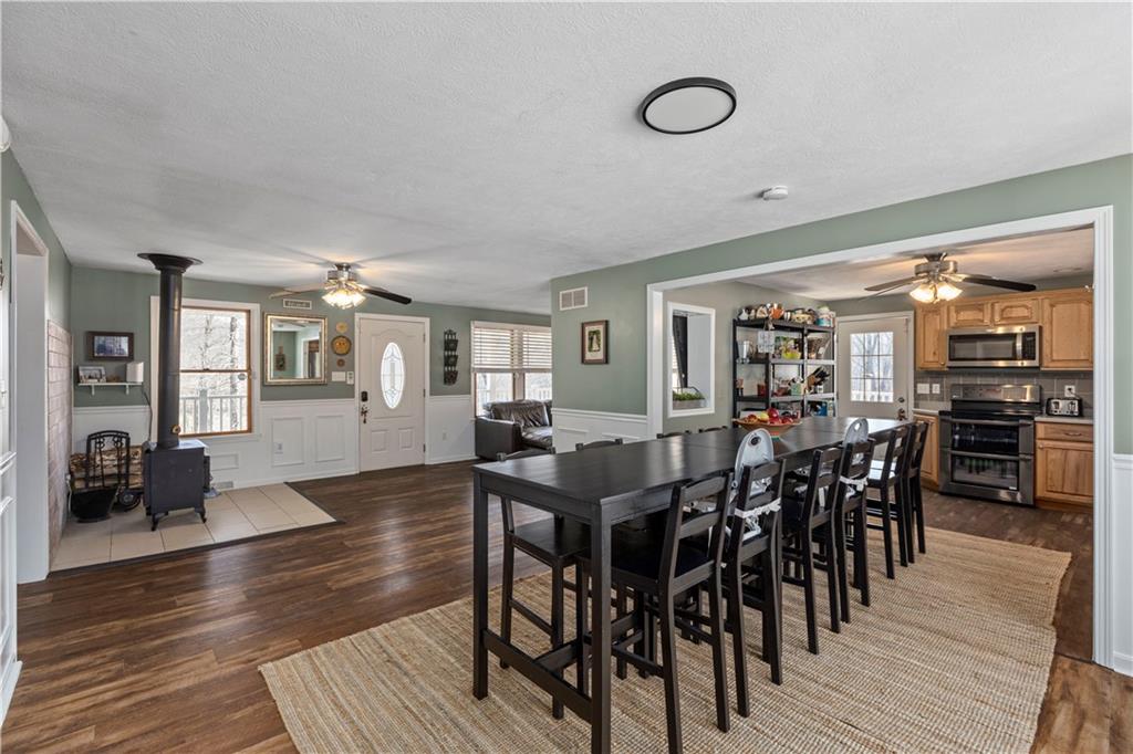 282 Snowden Road Hookstown, PA 15050 - Photo 11 of 25 a view of a dining room with furniture and wooden floor
