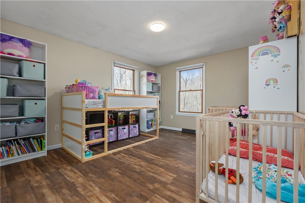 282 Snowden Road Hookstown, PA 15050 - Photo 20 of 25 a bedroom with furniture and a book shelf