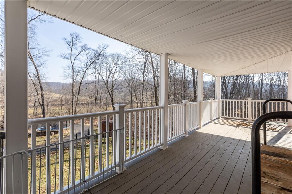 282 Snowden Road Hookstown, PA 15050 - Photo 2 of 25 a view of a balcony with wooden floor