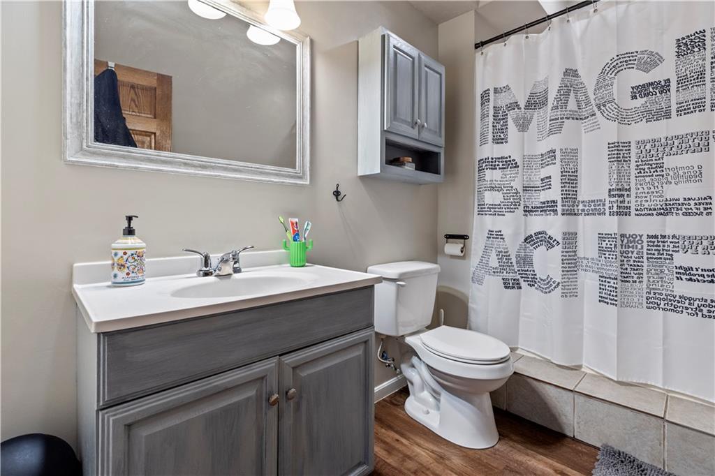 282 Snowden Road Hookstown, PA 15050 - Photo 24 of 25 a bathroom with a sink toilet and shower