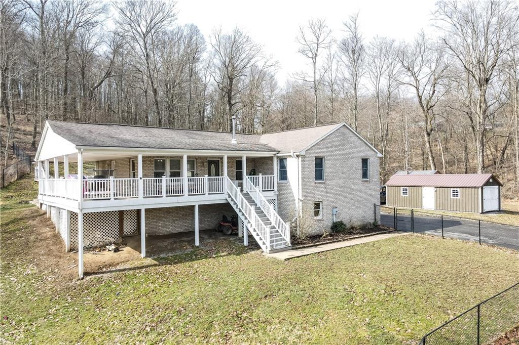 282 Snowden Road Hookstown, PA 15050 - Photo 6 of 25 front view of a house with a yard