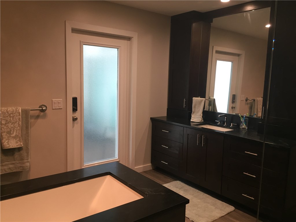 1953 Robalo Drive Vero Beach, FL 32960 - Photo 7 of 12 a room with a window and a mirror