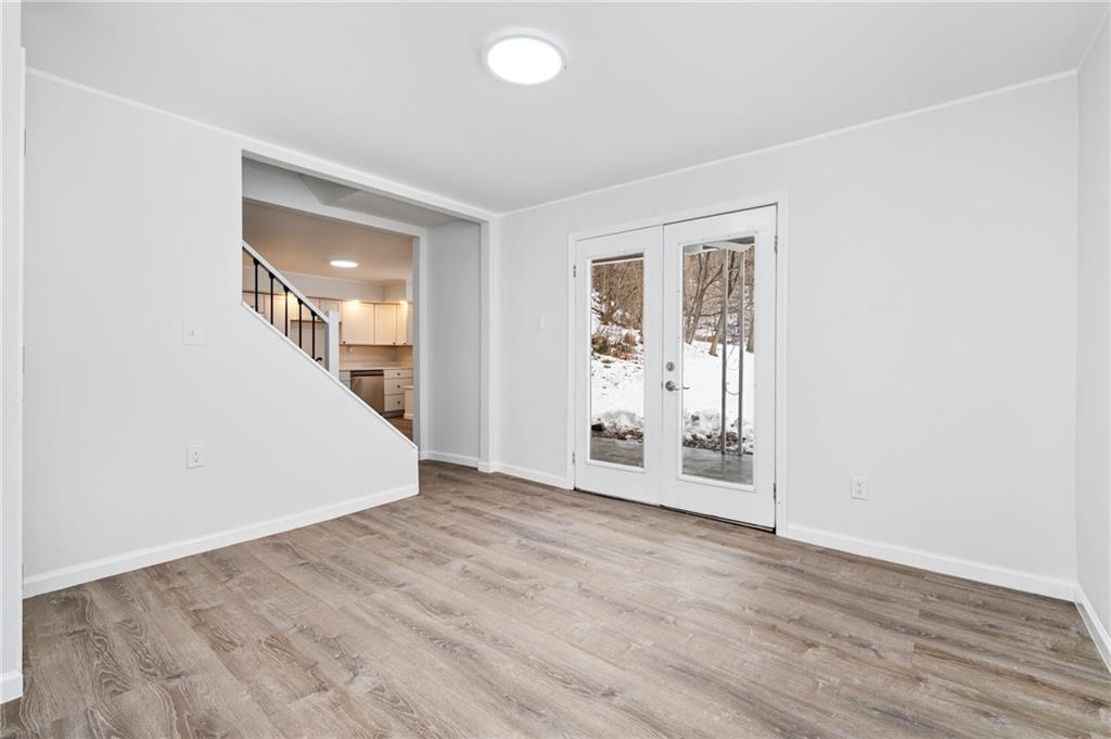 3005 Walton Road Finleyville, PA 15332 - Photo 15 of 31 an empty room with wooden floor and windows