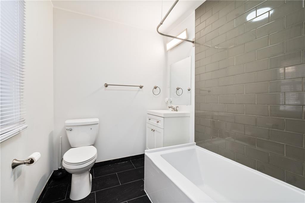 3005 Walton Road Finleyville, PA 15332 - Photo 21 of 31 a bathroom with a toilet a sink and bathtub