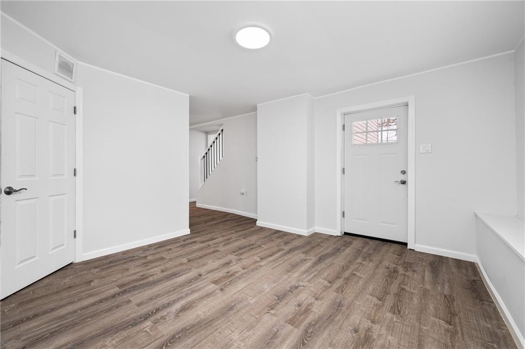 3005 Walton Road Finleyville, PA 15332 - Photo 23 of 31 a view of an empty room with wooden floor