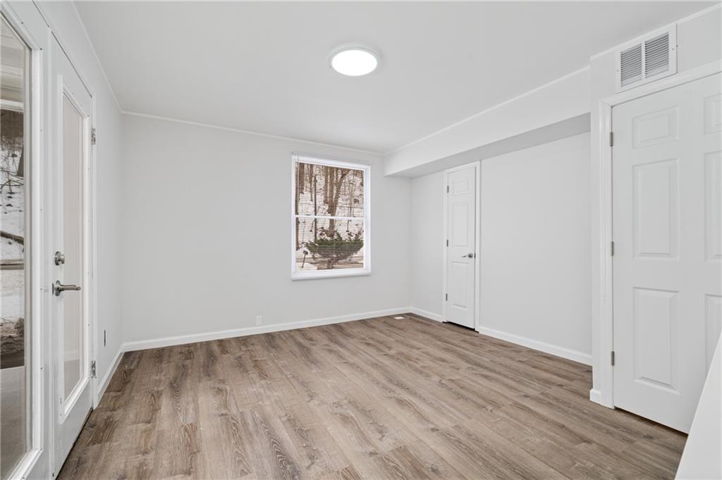 3005 Walton Road Finleyville, PA 15332 - Photo 25 of 31 wooden floor in an empty room with a window
