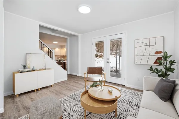 a living room with furniture and a table