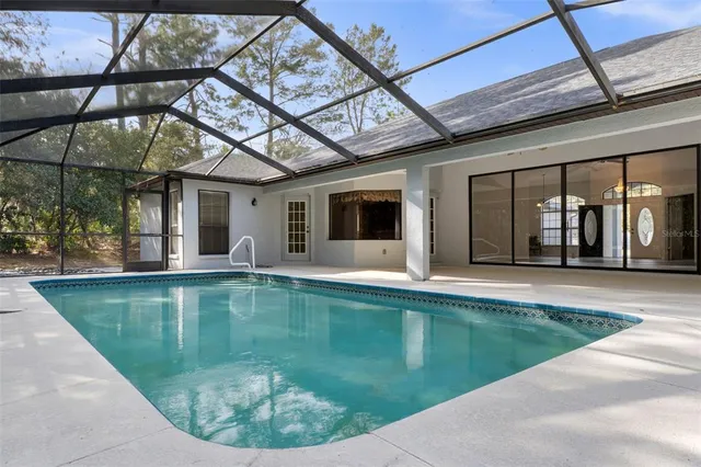 a backyard of a house with lots of green space