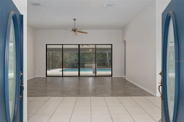 a view of an entryway with a glass door
