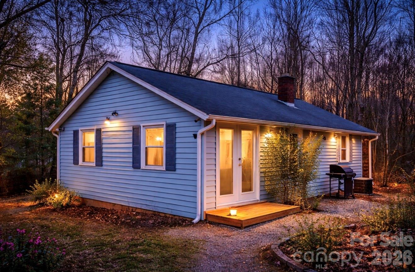 38 Pisgah View Road Asheville, NC 28806 - Photo 1 of 24 a view of a house with backyard and porch