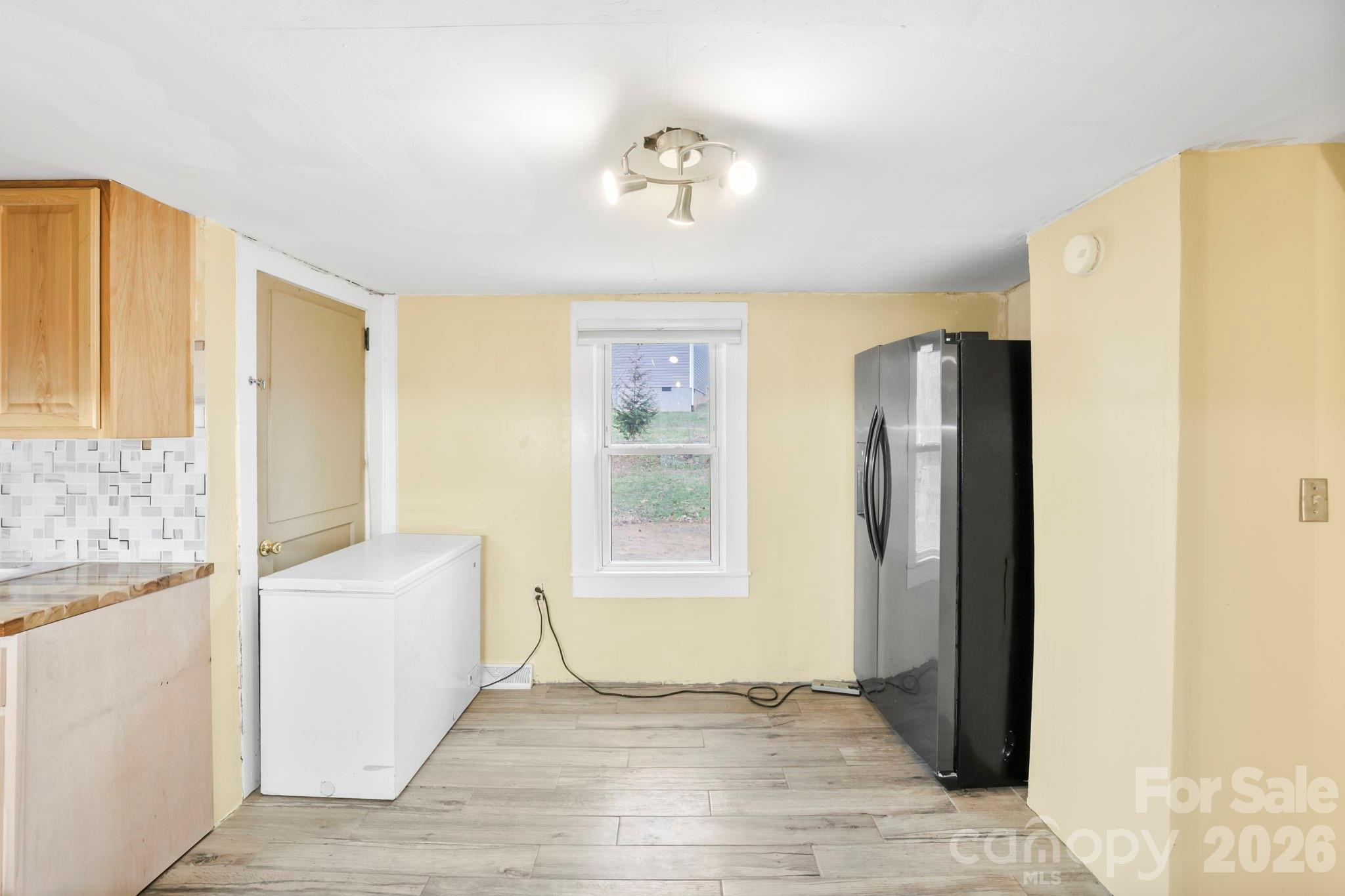 38 Pisgah View Road Asheville, NC 28806 - Photo 13 of 24 a view of an empty room with a window