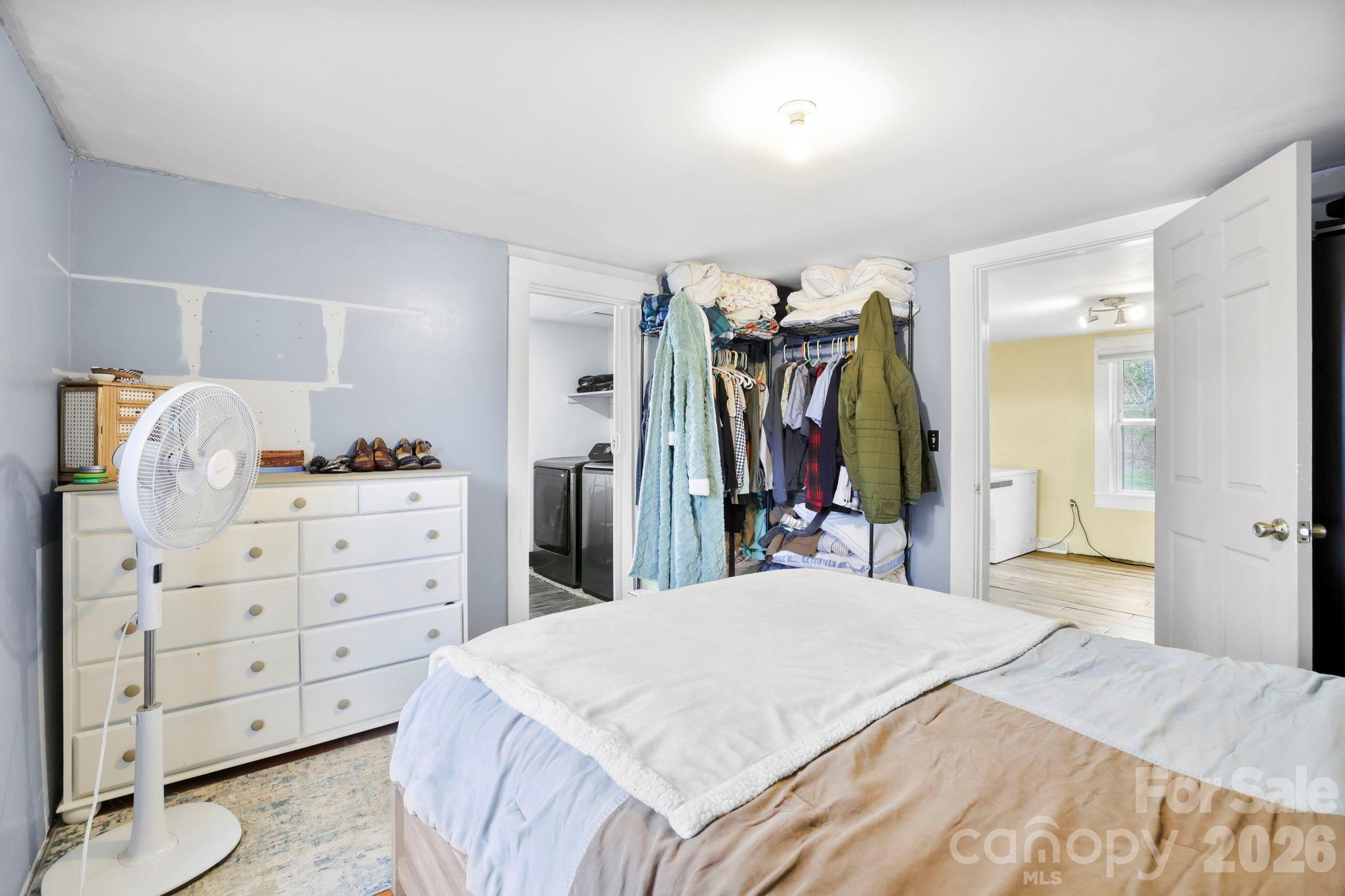 38 Pisgah View Road Asheville, NC 28806 - Photo 17 of 24 a bed room with a bed and a closet