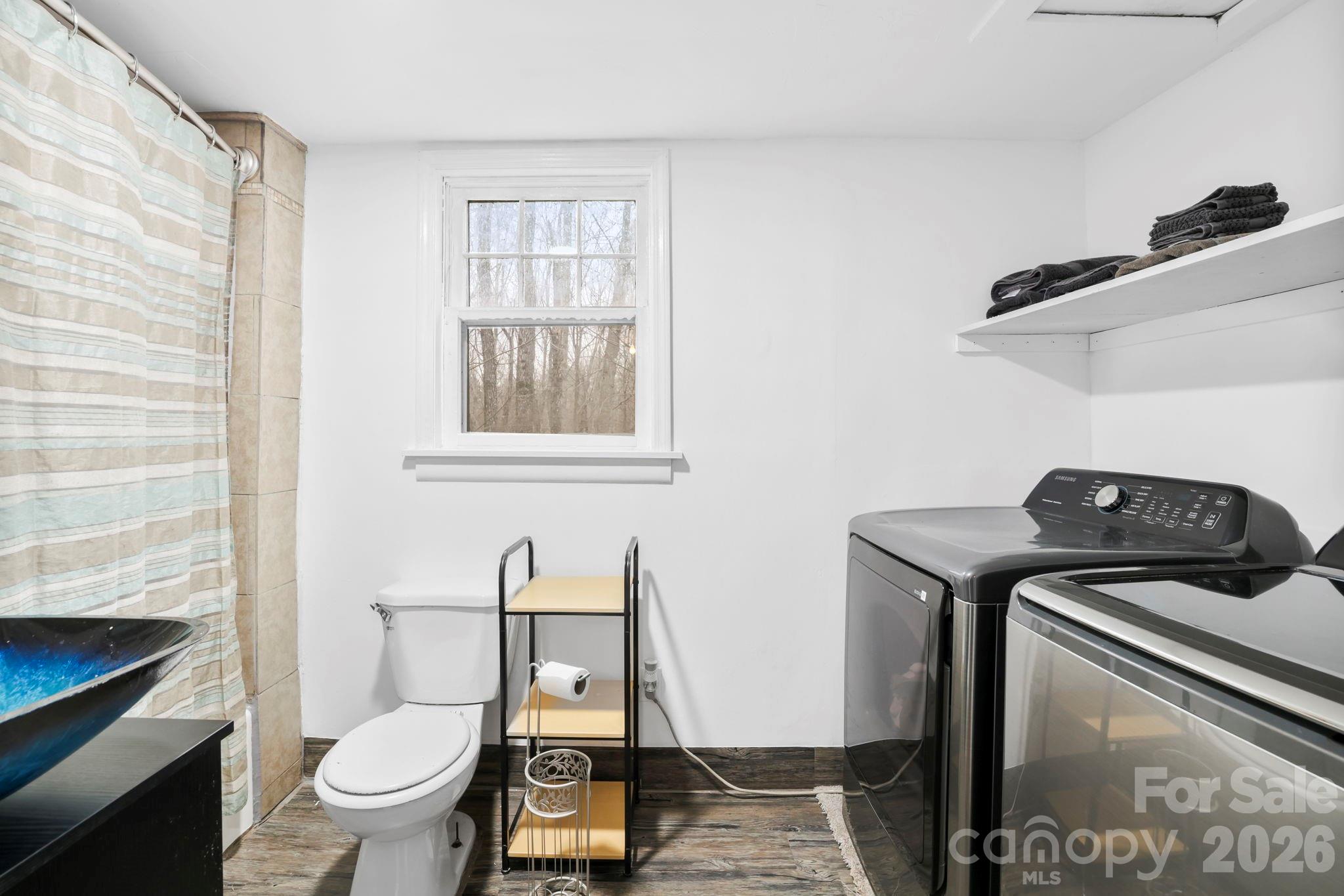 38 Pisgah View Road Asheville, NC 28806 - Photo 19 of 24 a view of bathroom with a toilet and a sink