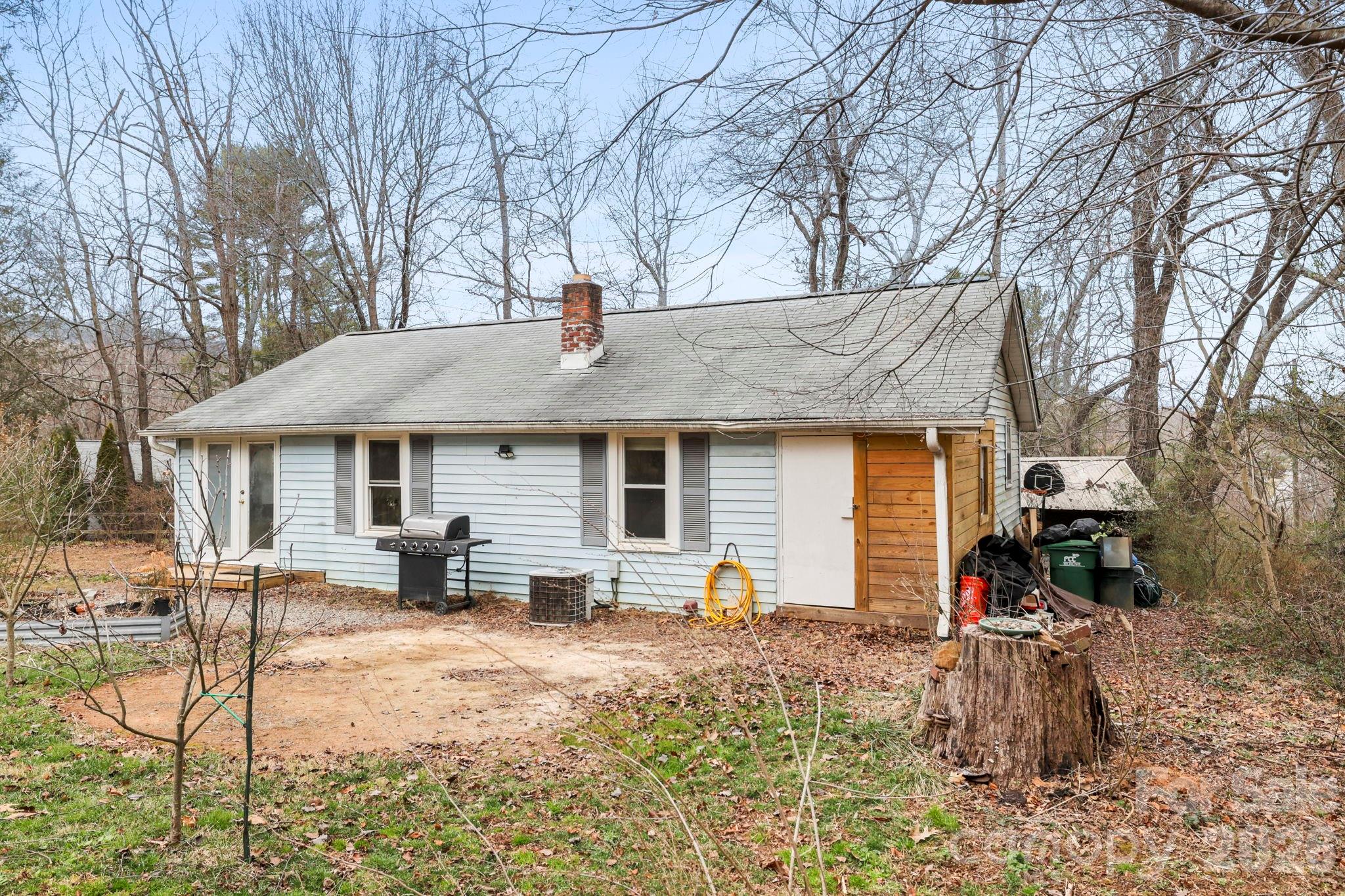 38 Pisgah View Road Asheville, NC 28806 - Photo 21 of 24 a view of a house with backyard