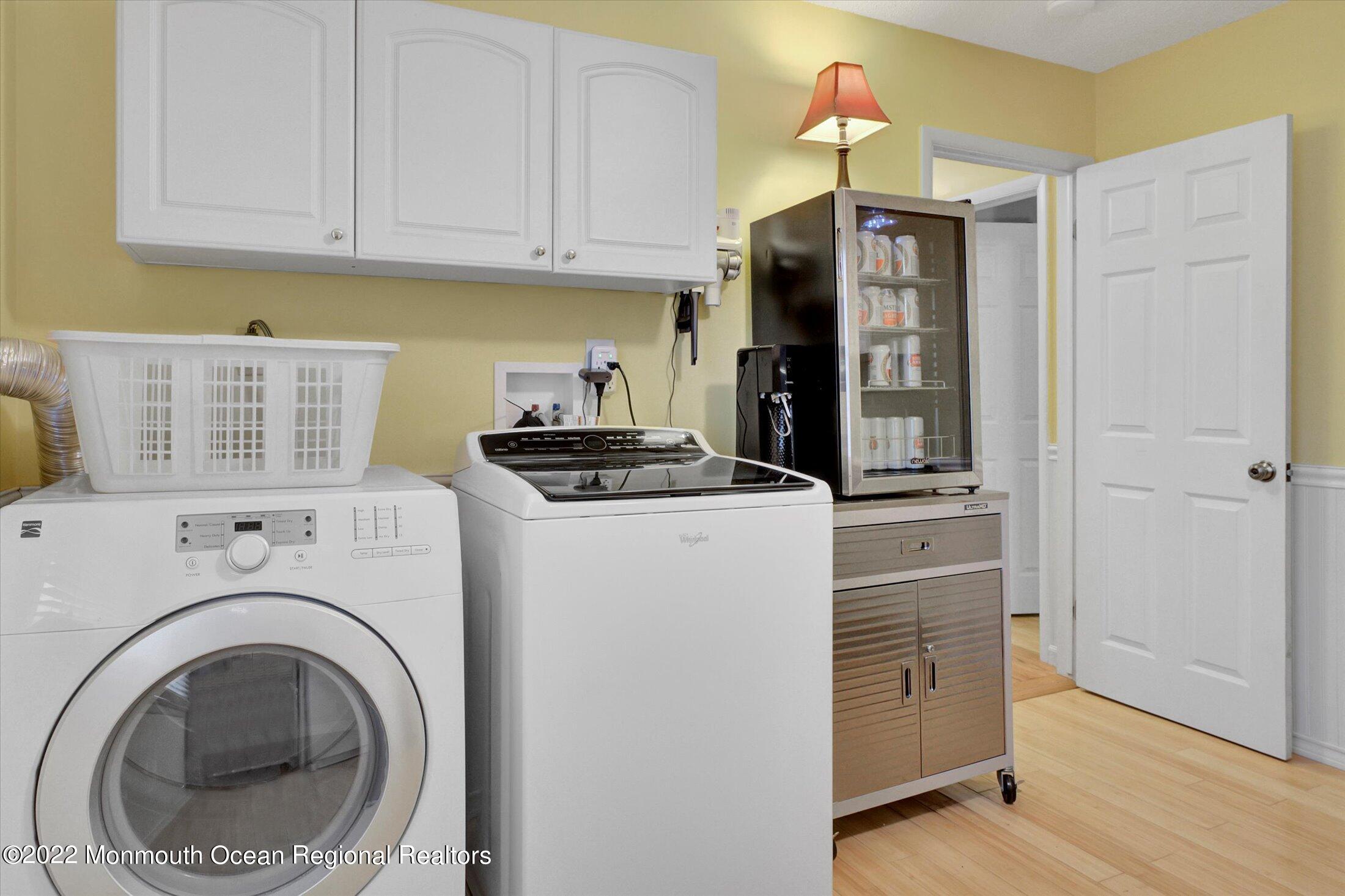 156 Topside Road Manahawkin, NJ 08050 - Photo 14 of 19 a kitchen with cabinets and a stove top oven