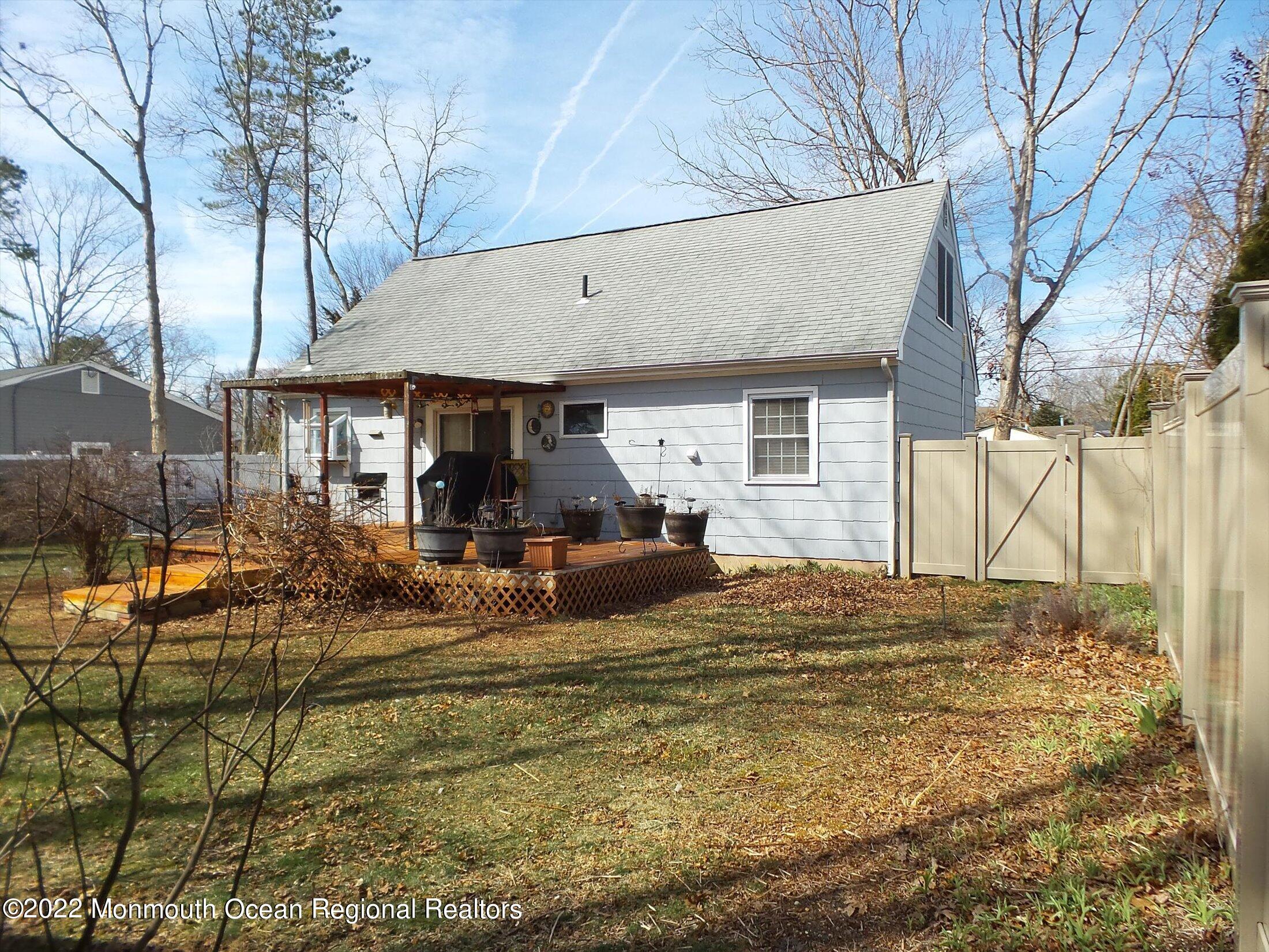 156 Topside Road Manahawkin, NJ 08050 - Photo 16 of 19 a view of a house with snow on the ground