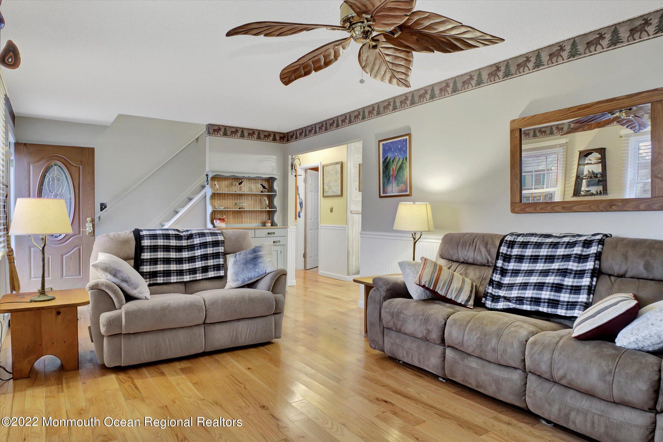156 Topside Road Manahawkin, NJ 08050 - Photo 4 of 19 a living room with furniture