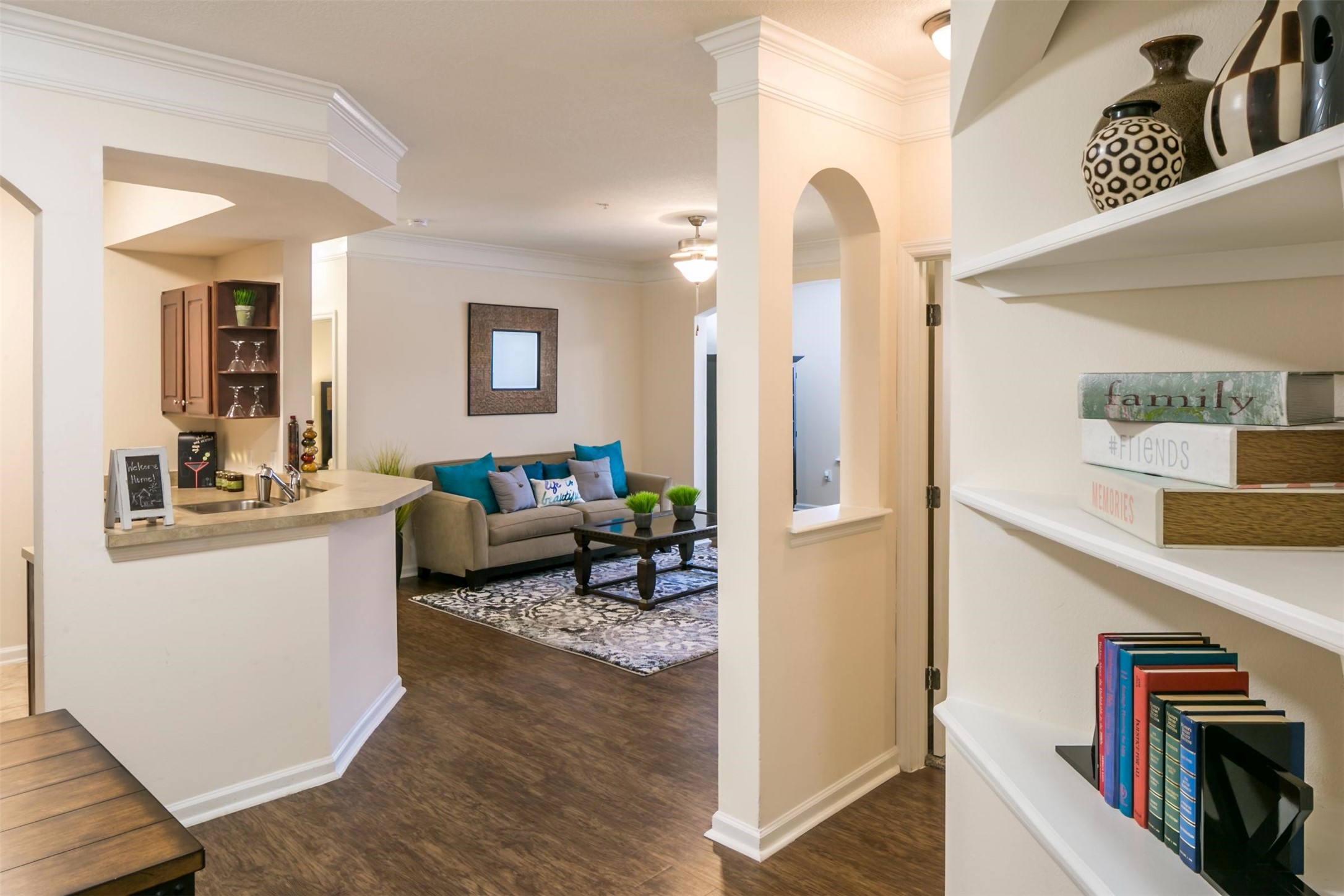 15270 Voss Road, Unit 435 Sugar Land, TX 77498 - Photo 2 of 13 a living room with furniture and a flat screen tv