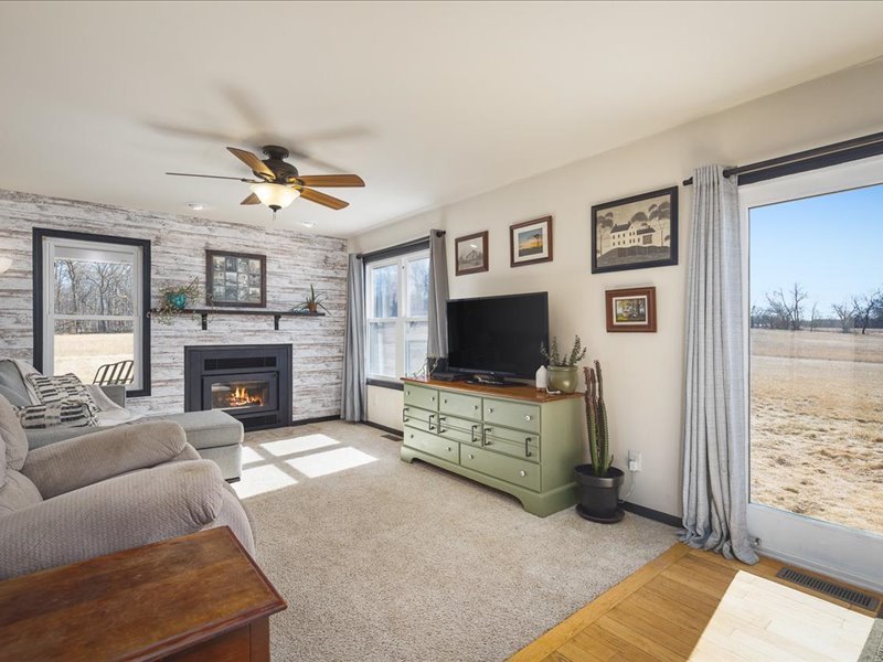 911.41 Melugins Compton, IL 61318 - Photo 15 of 67 a living room with furniture and a flat screen tv