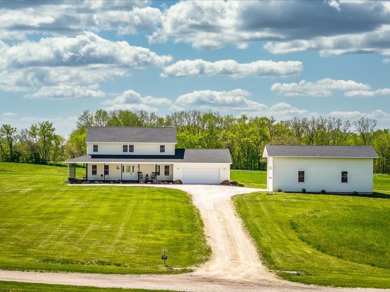 911.41 Melugins Compton, IL 61318 - Photo 3 of 67 a view of a swimming pool with a garden