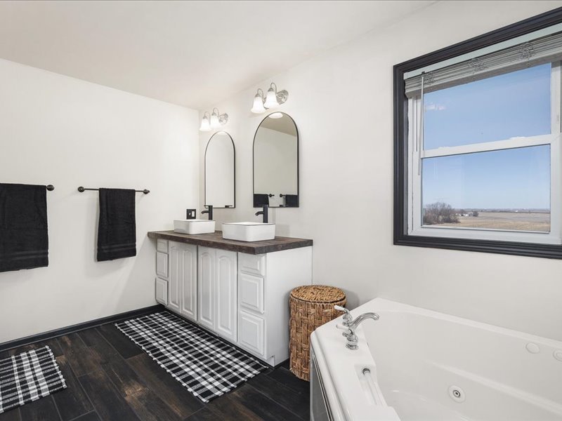 911.41 Melugins Compton, IL 61318 - Photo 35 of 67 a bathroom with a sink and a mirror