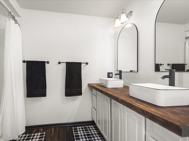 911.41 Melugins Compton, IL 61318 - Photo 36 of 67 a bathroom with a sink and a mirror