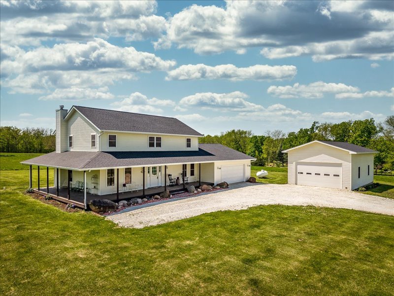 911.41 Melugins Compton, IL 61318 - Photo 5 of 67 a view of a house with pool and wooden fence