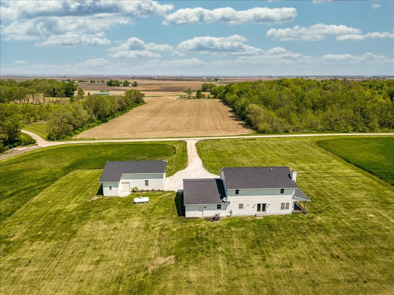911.41 Melugins Compton, IL 61318 - Photo 60 of 67 an aerial view of residential houses with outdoor space and swimming pool