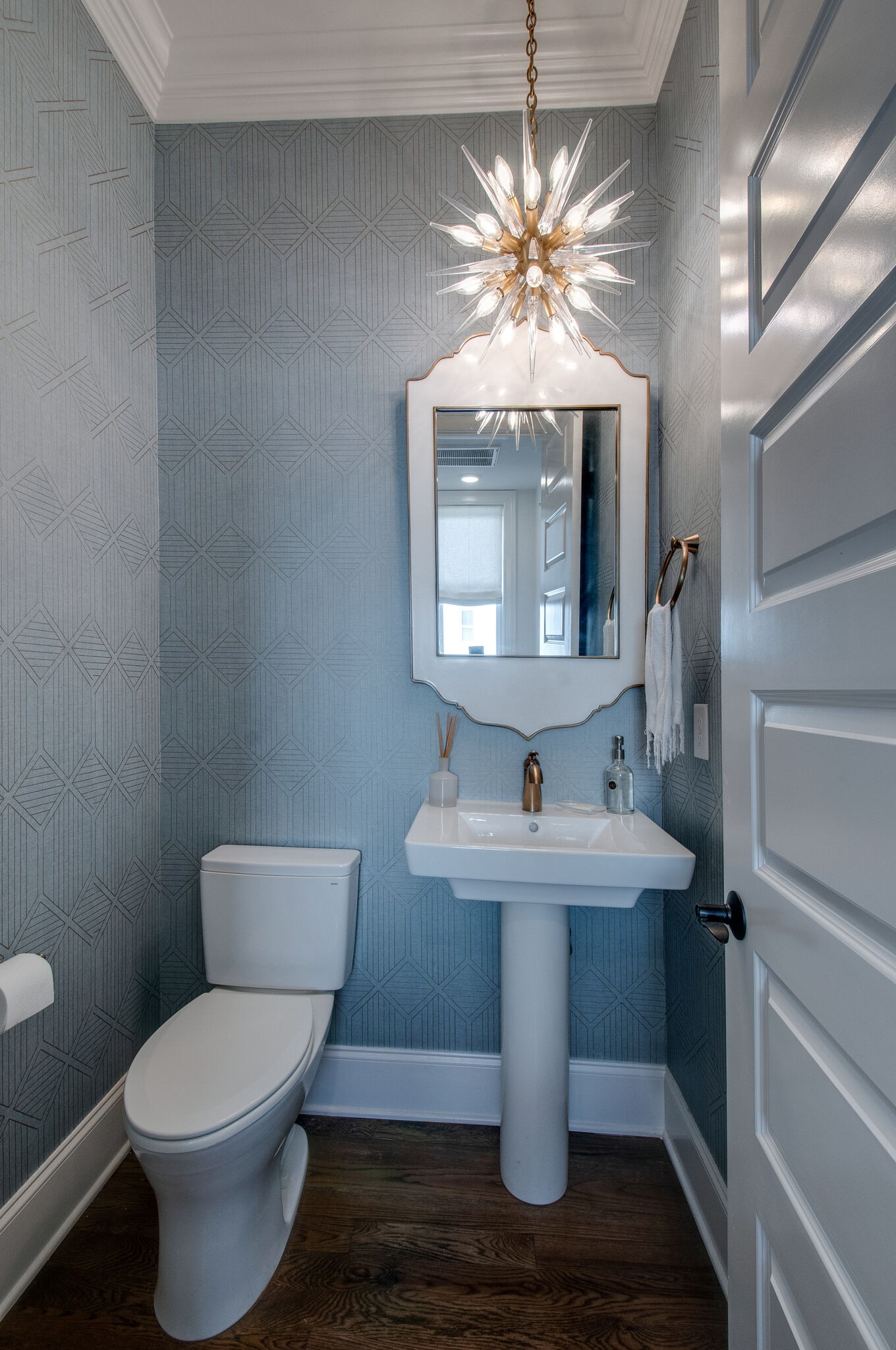 101 Front Street Franklin, TN 37064 - Photo 24 of 50 a bathroom with a toilet sink and mirror